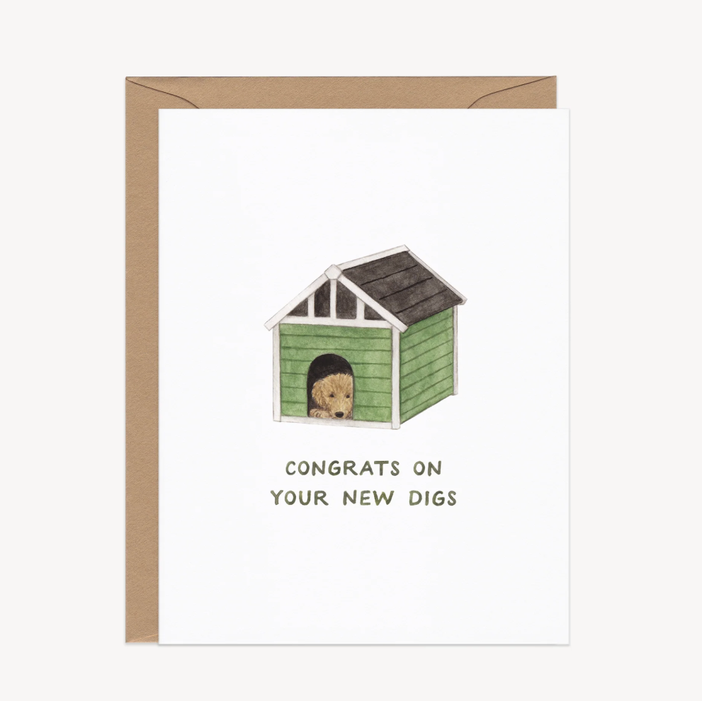 Greeting card with a illustration of a dog in  small house, and text 'Congrats on your new digs' on a white background.