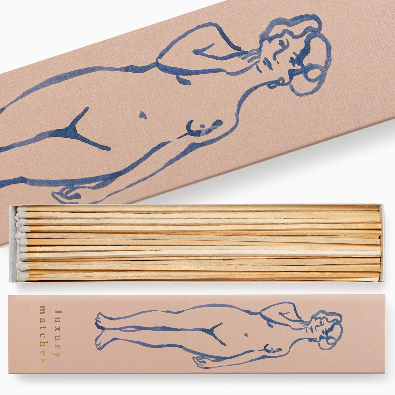Matchbox with matches and matching lid featuring a stylized nude figure on a beige background.