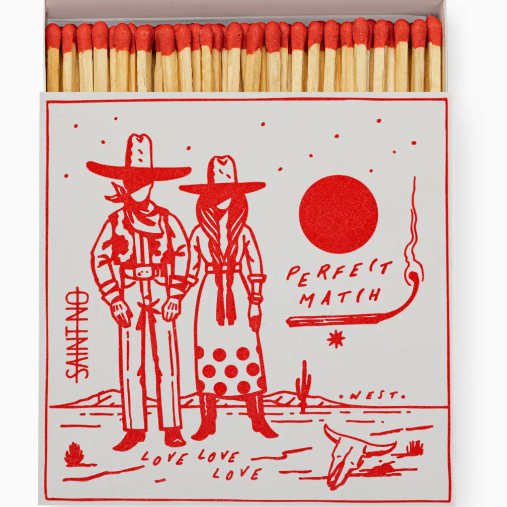Matches with a decorative box featuring two people in cowboy hats and the text 'Perfect Match'.