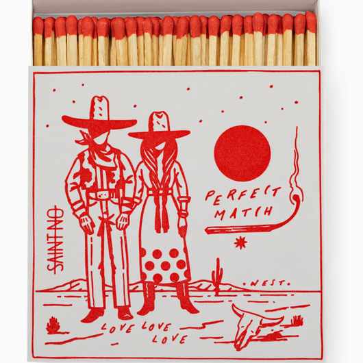 Matches with a decorative box featuring two people in cowboy hats and the text 'Perfect Match'.