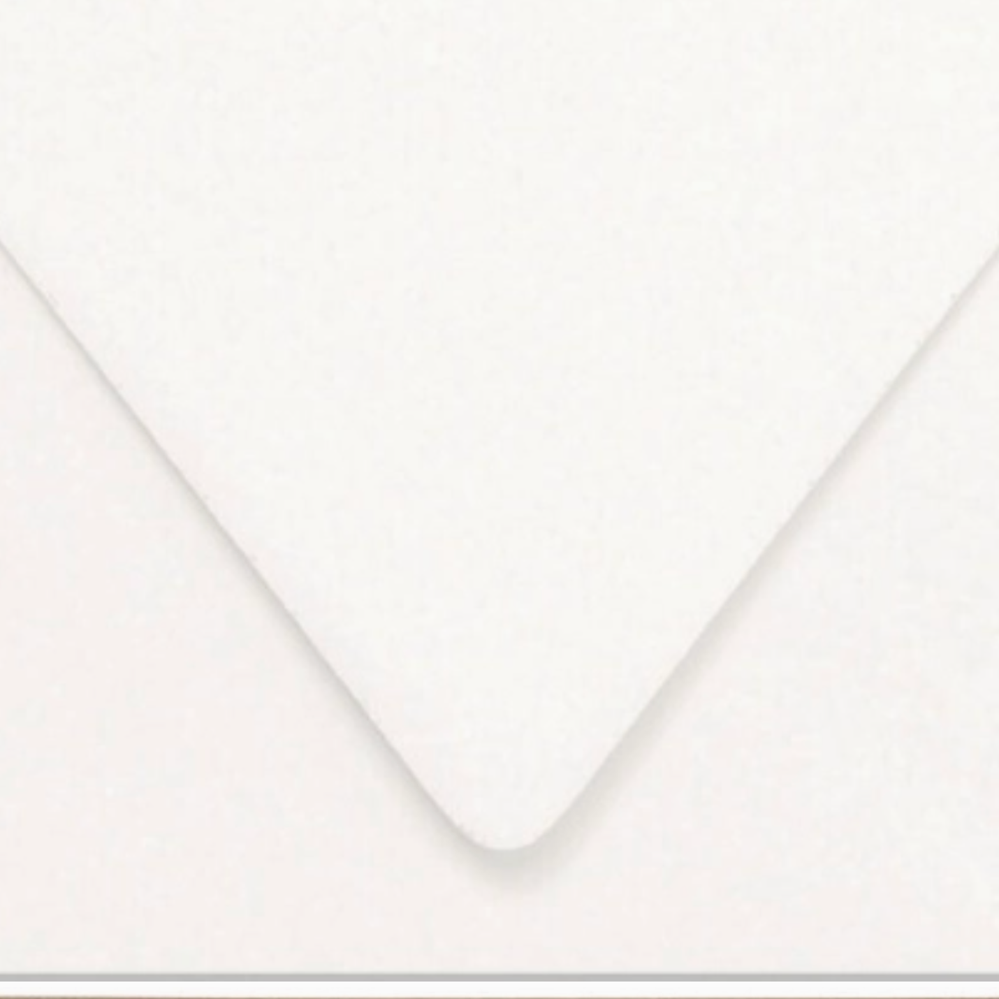 Close-up of a white envelope corner on a white background